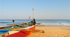 Old-fishing-boat-on-a-sandy-shore, Goa, India